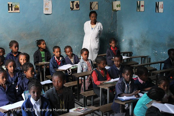 Primary school teacher in her class