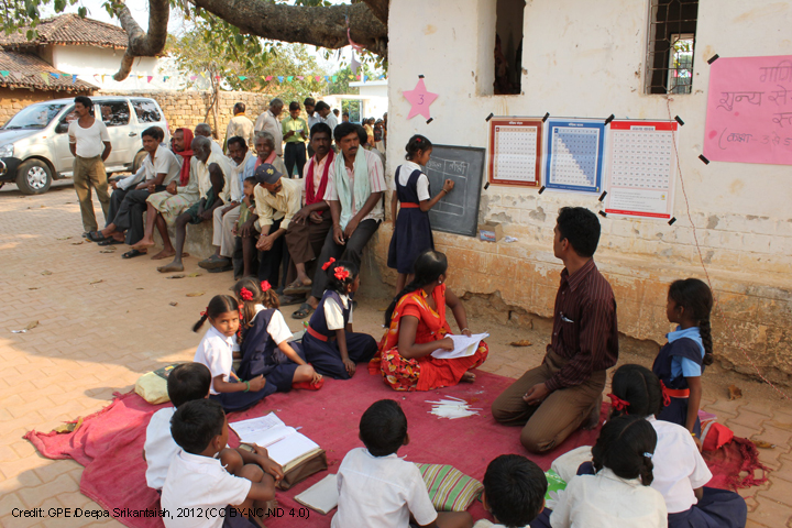 Girl participates in class, India