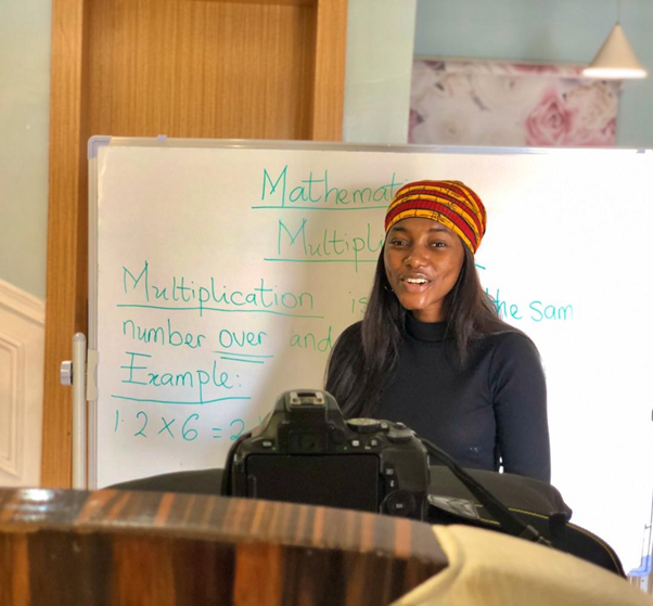 Teach For Nigeria teacher Precious Adegunle recording a math lesson at home for her students