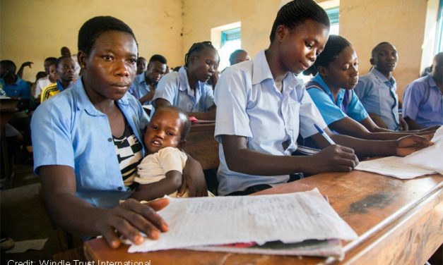 Female student attends catch-up classes with her baby