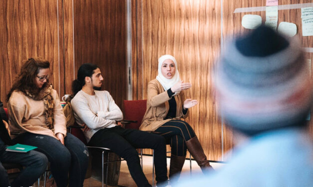 Higher education students in a seminar