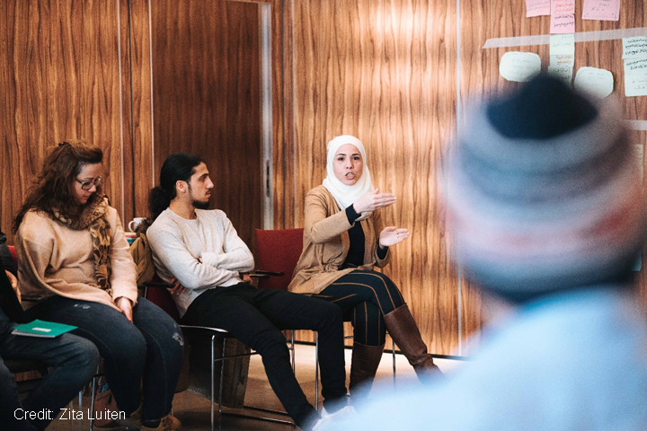 Higher education students in a seminar