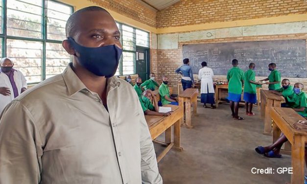 School representative wearing a face mask in the classroom, Rwanda 2021.