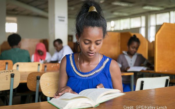 Girl reads in the library at a special needs school, Oromia, Ethiopia