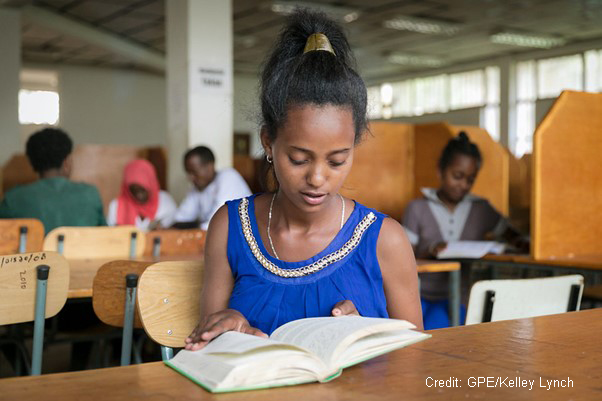 Girl reads in the library at a special needs school, Oromia, Ethiopia