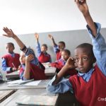 Students raising hands in class, Hidassie School, Addis Ababa, Ethiopia