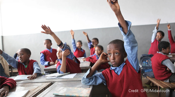 Students raising hands in class, Hidassie School, Addis Ababa, Ethiopia