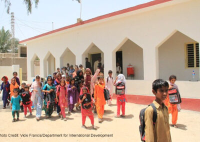 Children leaving a newly-built school, Pakistan