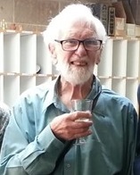 Alan Rogers raising a glass