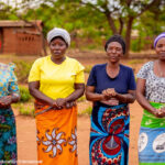 Four Mothers from a Mother Group and Learning Centre Management Committee members in Link Education International's TEAM Girl Malawi project.