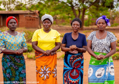 Four Mothers from a Mother Group and Learning Centre Management Committee members in Link Education International's TEAM Girl Malawi project.