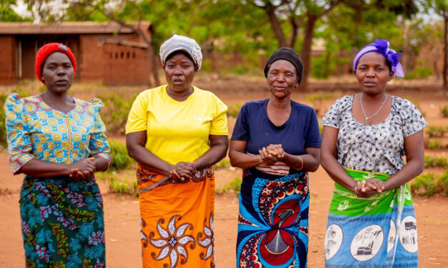 Four Mothers from a Mother Group and Learning Centre Management Committee members in Link Education International's TEAM Girl Malawi project.