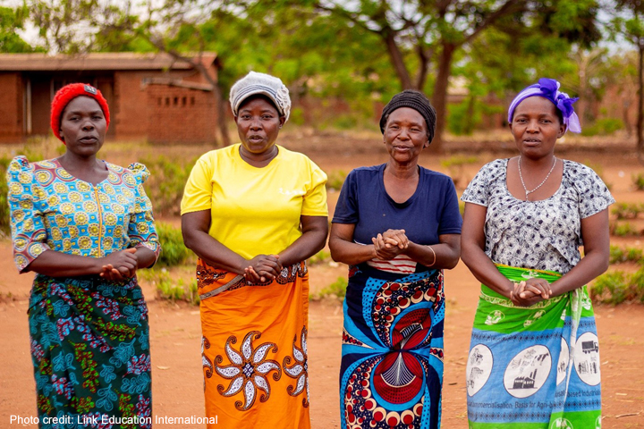 Four Mothers from a Mother Group and Learning Centre Management Committee members in Link Education International's TEAM Girl Malawi project.