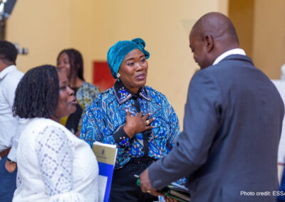 African education researchers networking at a conference.