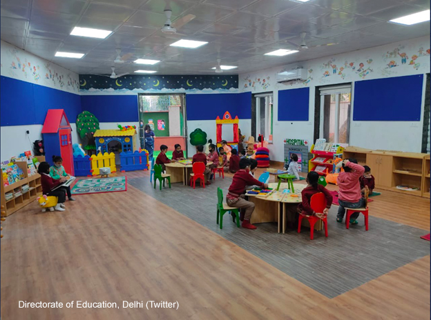 Children engaged in play activities in small groups at the Montessori lab at Rama Pratap SV, Rajendra Nagar-1, Delhi