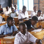 Students sitting in a classroom in Rwanda