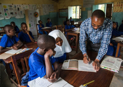 Teacher supporting deaf pupils in an inclusive school in Singida, Tanzania.