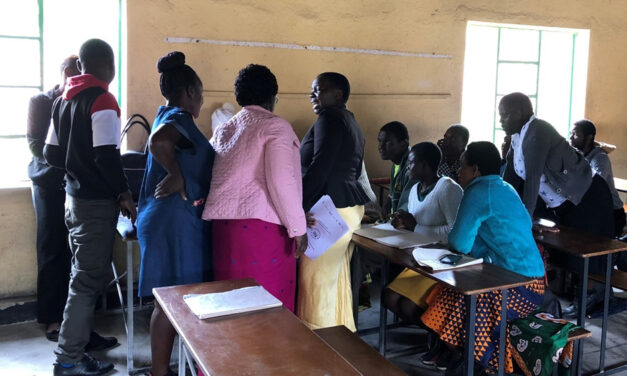 Community educators supported by school buddies engaged in an inter-hub reflection meeting. Matanda, Zimbabwe, 2022.