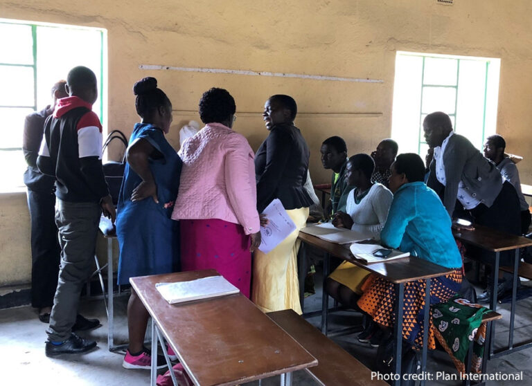 Community educators supported by school buddies engaged in an inter-hub reflection meeting. Matanda, Zimbabwe, 2022.