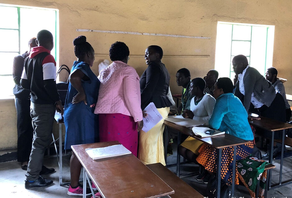 Community educators supported by school buddies engaged in an inter-hub reflection meeting. Matanda, Zimbabwe, 2022.