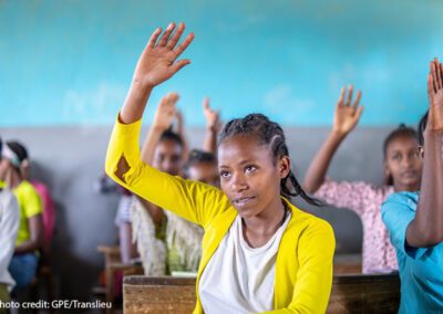 Female student lifts her hand in a classroom in Yirba Yanase Secondary School in Hawassa, Ethiopia.