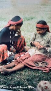 ‘Making bead necklaces on Bajhang airfield, Nepal’, 