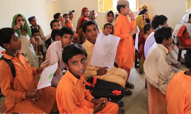 Mohsin Junejo (the boy front centre) is back in school in Nawan Juneja village, in Pakistan's Sindh province, but his family still live in a tent following the 2010 flood. His village as completely underwater for months.