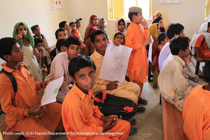 Mohsin Junejo (the boy front centre) is back in school in Nawan Juneja village, in Pakistan's Sindh province, but his family still live in a tent following the 2010 flood. His village as completely underwater for months.