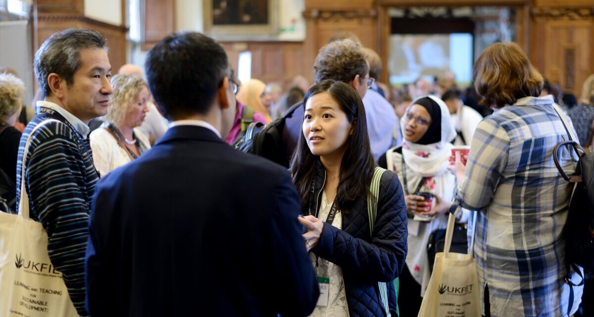 A group of people in a social setting at an UKFIET Conference