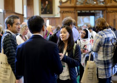 A group of people in a social setting at an UKFIET Conference