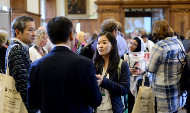 A group of people in a social setting at an UKFIET Conference