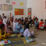 Pre-primary school children sit on the floor in an early childhood education class in Punjab, Pakistan.