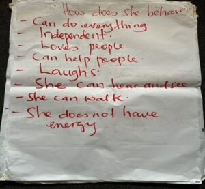 2.	Flip chart from focus group in Wakiso, Uganda. The question is ‘How does she behave?’ The girls responded that she can do everything, is independent, loves people, can help people, laughs, can hear and see, she can walk and she does not have energy.