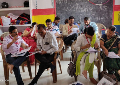 Photo of teachers in pairwork discussions at a recent workshop in India.