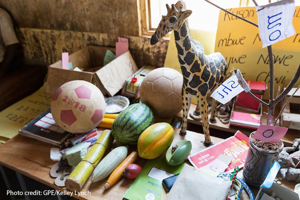 Locally made teaching and learning materials including a giraffe and a tree (and a few balls) in the Standard 2 classroom. Nyerere Primary School, Mpanda MC, Katavi, Tanzania