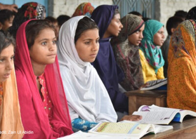 Adolescent girls sit at desks at the Siyani Sahelian Remedial Learning Center in Muzaffargarh Punjab, Pakistan.