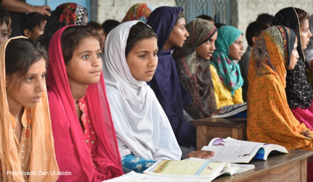 Adolescent girls sit at desks at the Siyani Sahelian Remedial Learning Center in Muzaffargarh Punjab, Pakistan.