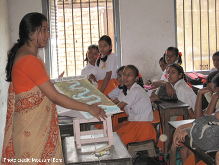 Demonstration of learning aid by a trainee teacher at school.