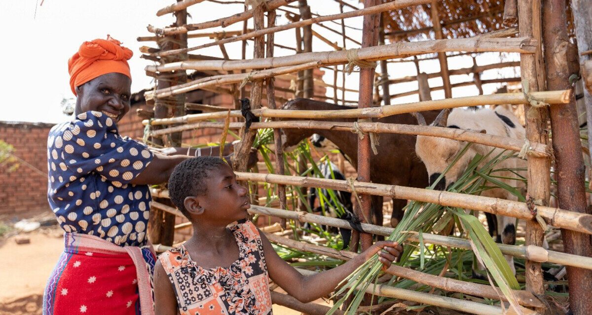 Shelista, who is deaf and attends an inclusive school, with her grandmother in Malawi.