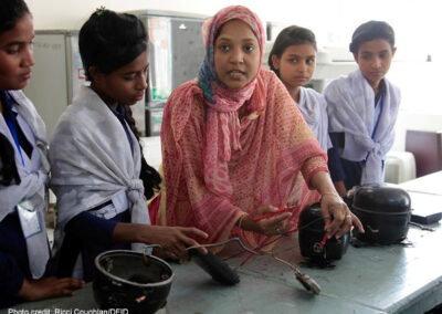 A Bangladeshi female teacher, Shirina Akter, instructing a glass of girls using electronic equipment at UCEP (Underprivileged Children’s Educational Programme) school in Dhaka, Bangladesh.