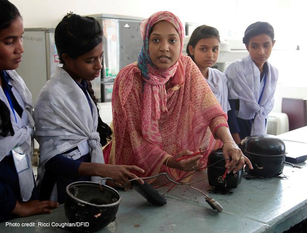 A Bangladeshi female teacher, Shirina Akter, instructing a glass of girls using electronic equipment at UCEP (Underprivileged Children’s Educational Programme) school in Dhaka, Bangladesh.
