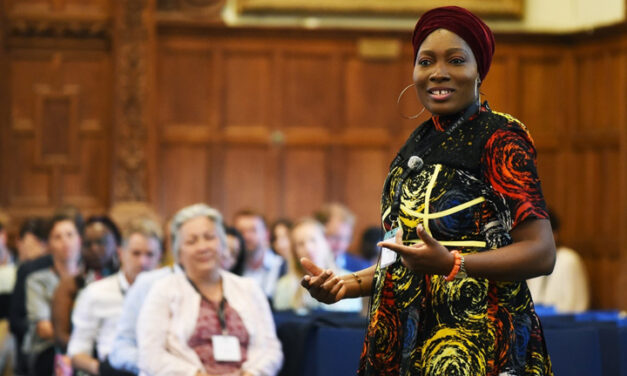 Basirat Razq Shuaib delivering her poem at UKFIET Conference 2023 in Oxford