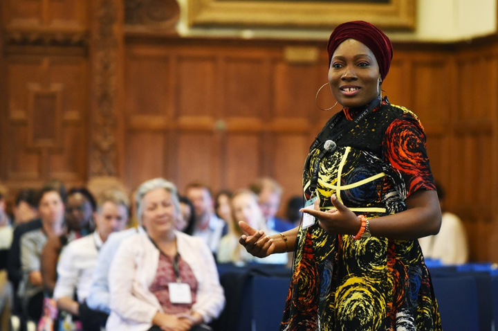 Basirat Razq Shuaib delivering her poem at UKFIET Conference 2023 in Oxford