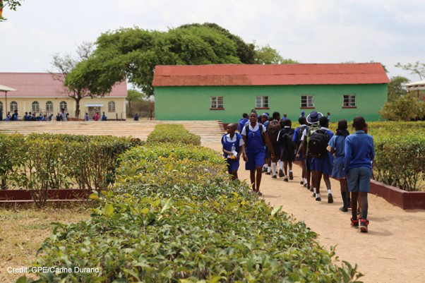 Students walk to class at Murape Primary School, Zimbabwe.