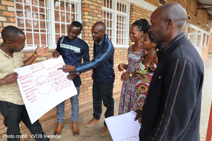 Trainers facilitating an in-person session with teachers