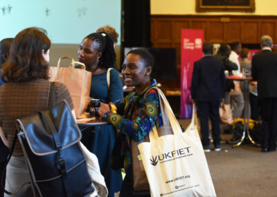 A group of people chatting at an event