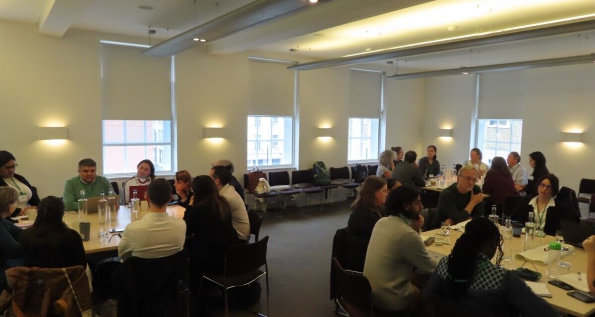 Three table groups of participants at the UKFIET and British Council workshop on language, held in London in March 2024.