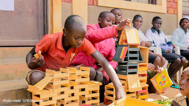 Students build during an educational activity at Isare Youth Center, Burundi.