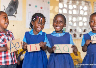Pre-school children in Malawi learn the alphabet.