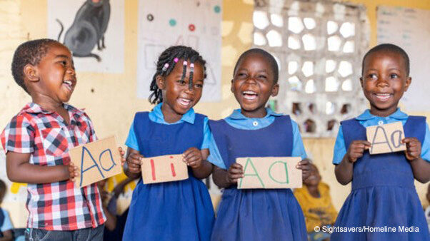 Pre-school children in Malawi learn the alphabet.